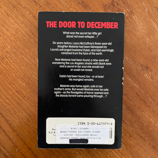 The Door To December - Leigh Nichols