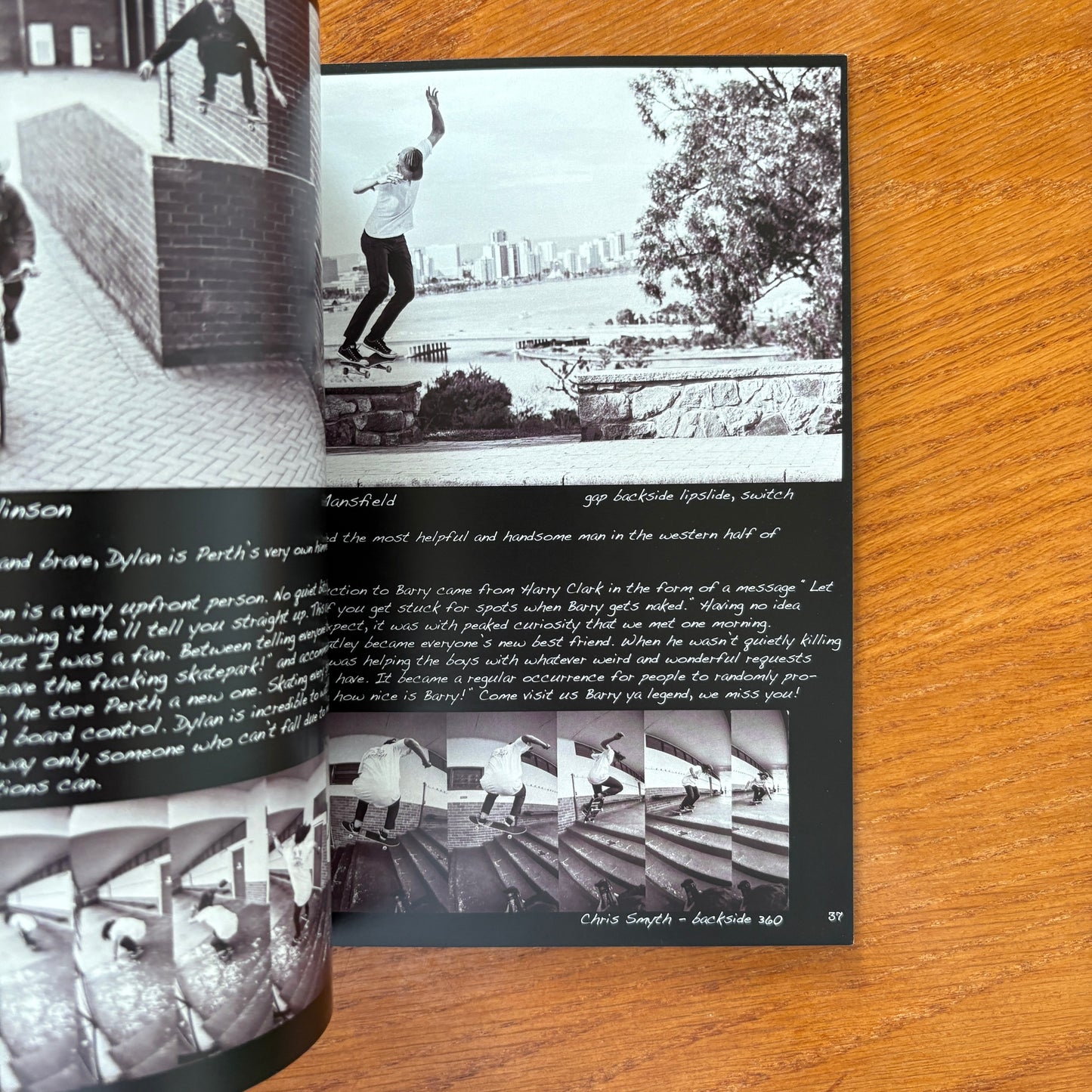 Open book showing a black and white photo of a person on a skateboard next to a wooden structure.