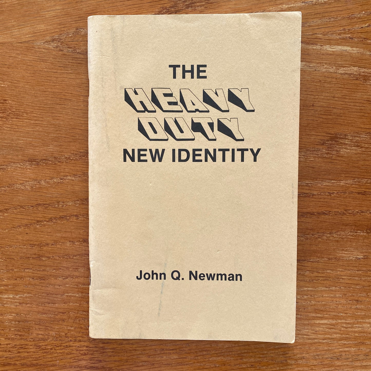 The Heavy Duty New Identity - John Q. Newman