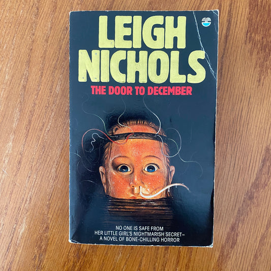 The Door To December - Leigh Nichols